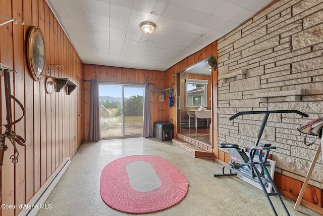 17871 N Ramsey Rd, Rathdrum, ID 83858 - workout area featuring baseboard heating and wood walls