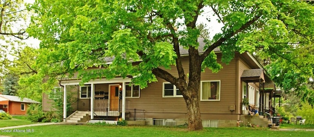 1422 E Young Ave, Coeur Dalene, ID 83814 - view of front of property featuring a front yard