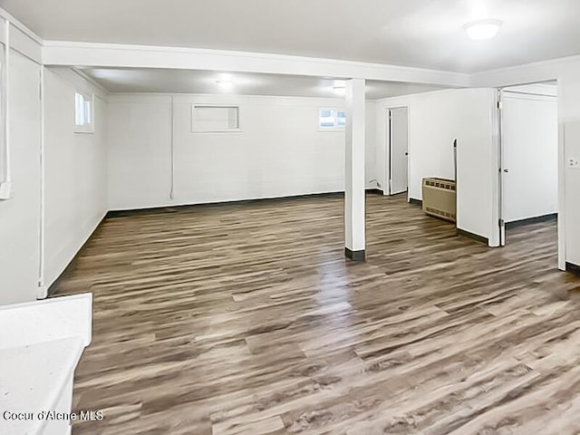 1422 E Young Ave, Coeur Dalene, ID 83814 - below grade area featuring wood finished floors and ornamental molding