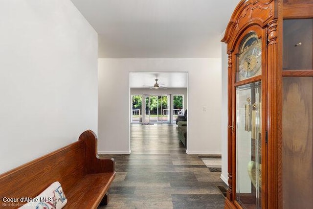 1547 E Stratford Dr, Hayden, ID 83835 - hall featuring dark wood finished floors and baseboards