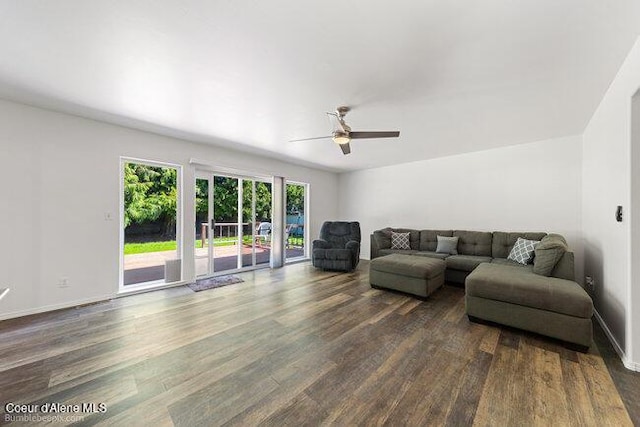 1547 E Stratford Dr, Hayden, ID 83835 - living area with a ceiling fan, baseboards, and dark wood finished floors