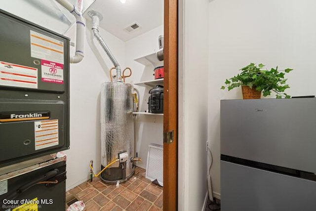 1547 E Stratford Dr, Hayden, ID 83835 - utilities with water heater and heating unit