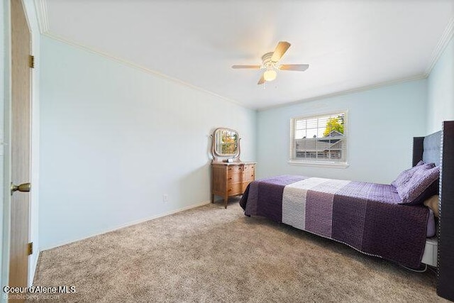 1547 E Stratford Dr, Hayden, ID 83835 - carpeted bedroom featuring crown molding and ceiling fan