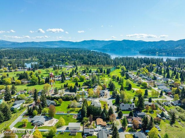1547 E Stratford Dr, Hayden, ID 83835 - aerial view with a forest view and a water and mountain view