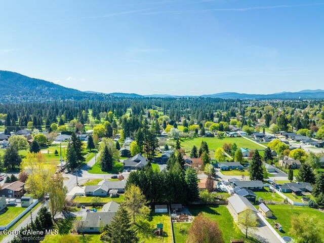 1547 E Stratford Dr, Hayden, ID 83835 - drone / aerial view featuring a mountain view and a residential view