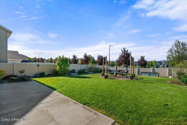 2097 W Calawah Ave, Post Falls, ID 83854 - view of yard featuring a patio