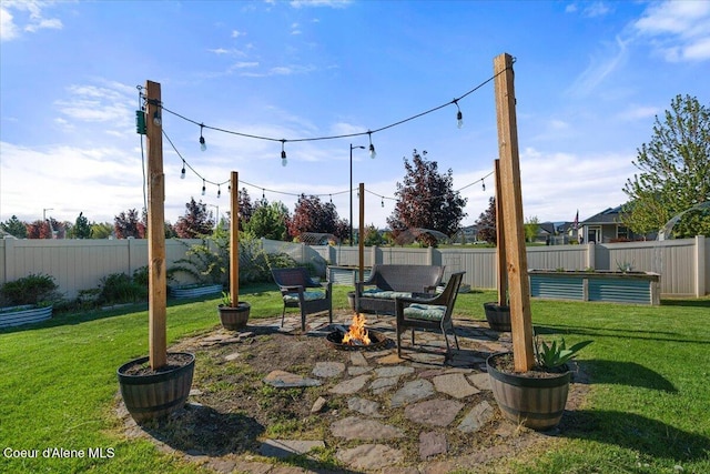 2097 W Calawah Ave, Post Falls, ID 83854 - view of yard with an outdoor fire pit