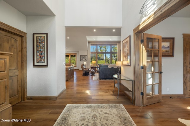 11671 N Spiraea Ln, Hayden, ID 83835 - entrance foyer with wood finished floors, baseboards, and a high ceiling