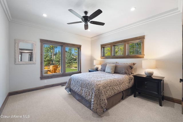 11671 N Spiraea Ln, Hayden, ID 83835 - bedroom with light colored carpet, crown molding, baseboards, recessed lighting, and ceiling fan