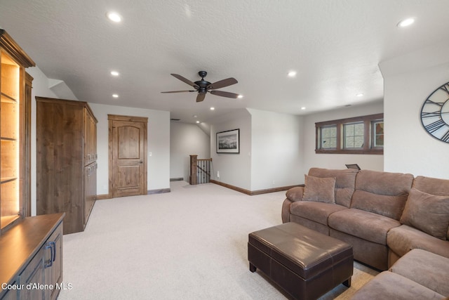 11671 N Spiraea Ln, Hayden, ID 83835 - living area with recessed lighting, light colored carpet, ceiling fan, and baseboards