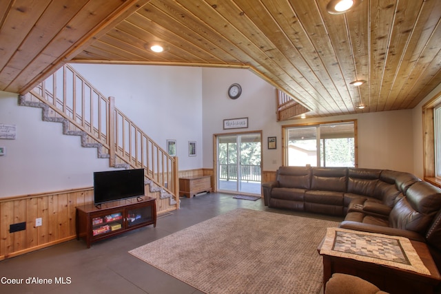 31582 E Hayden Lake Rd, Hayden, ID 83835 - living area with stairs, recessed lighting, wooden ceiling, finished concrete flooring, and wainscoting