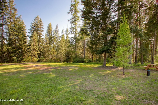 31582 E Hayden Lake Rd, Hayden, ID 83835 - view of yard with a forest view