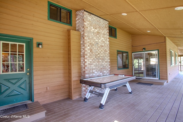 31582 E Hayden Lake Rd, Hayden, ID 83835 - wooden deck featuring covered porch