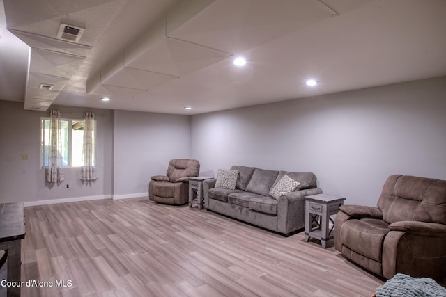 31582 E Hayden Lake Rd, Hayden, ID 83835 - living room with visible vents, light wood-style flooring, baseboards, and recessed lighting
