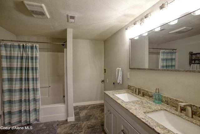31582 E Hayden Lake Rd, Hayden, ID 83835 - bathroom with visible vents, baseboards, and a sink