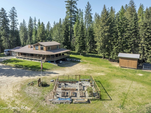 31582 E Hayden Lake Rd, Hayden, ID 83835 - drone / aerial view with a wooded view