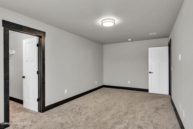 2878 N Callary St, Post Falls, ID 83854 - empty room with carpet flooring and baseboards