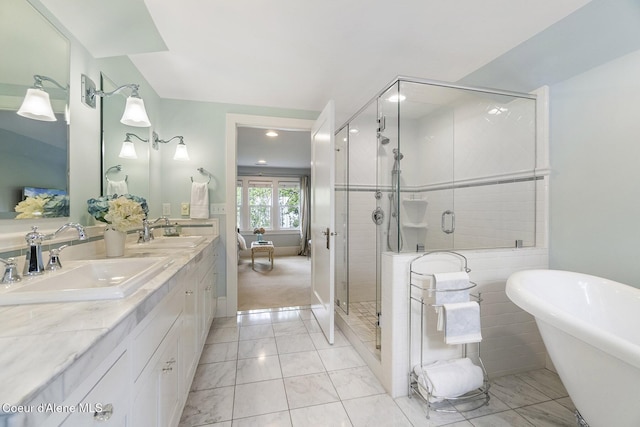 306 S Huron Ave, Sandpoint, ID 83864 - bathroom featuring a sink, a stall shower, and marble finish floor