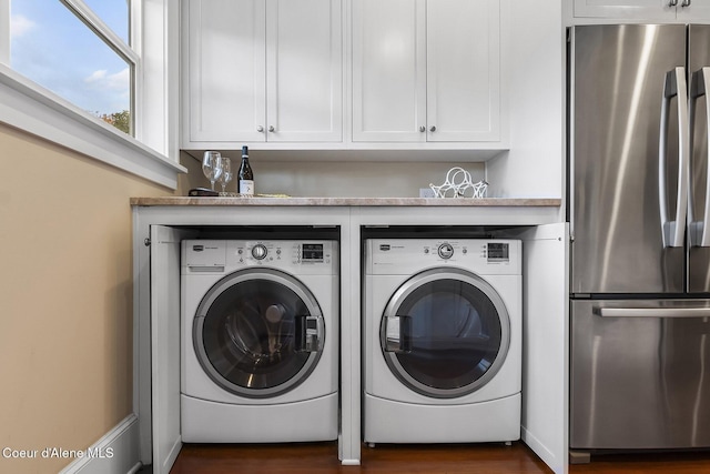 306 S Huron Ave, Sandpoint, ID 83864 - laundry area with dark wood-type flooring, laundry area, and washer and clothes dryer