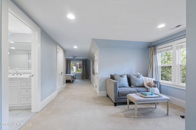 306 S Huron Ave, Sandpoint, ID 83864 - living area with light carpet, baseboards, and recessed lighting