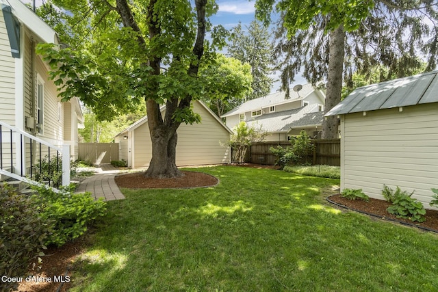 306 S Huron Ave, Sandpoint, ID 83864 - view of yard with a fenced backyard and an outdoor structure