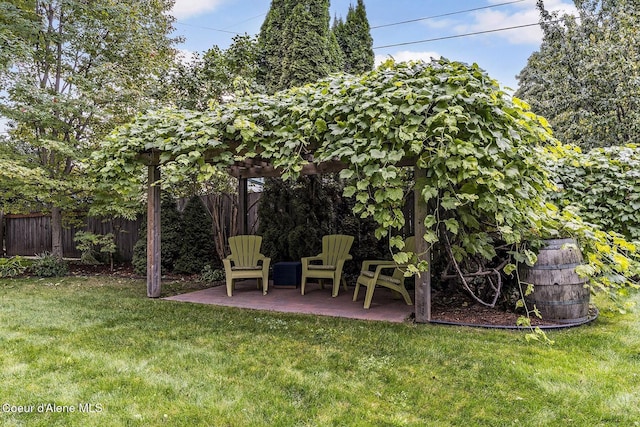 306 S Huron Ave, Sandpoint, ID 83864 - view of yard featuring a pergola, fence, and a patio area