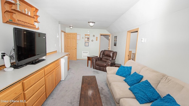 6616 Comanche St, Bonners Ferry, ID 83805 - living area featuring light colored carpet, lofted ceiling, and visible vents