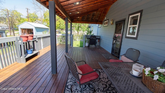 6616 Comanche St, Bonners Ferry, ID 83805 - wooden terrace with outdoor dining space and grilling area