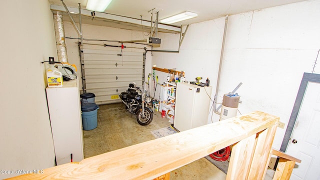 6616 Comanche St, Bonners Ferry, ID 83805 - garage with a garage door opener and a workshop area