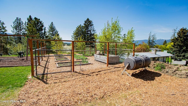 6616 Comanche St, Bonners Ferry, ID 83805 - view of jungle gym with a garden