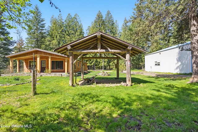 view of property's community with a yard