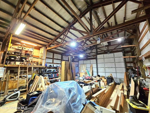 garage with a workshop area