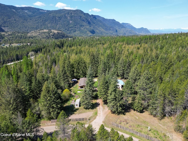 aerial view with a forest view and a mountain view