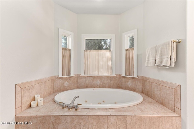 12795 N Yearling Cir, Hayden, ID 83835 - bathroom with a whirlpool tub
