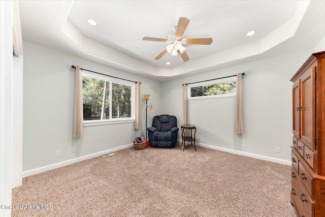 12795 N Yearling Cir, Hayden, ID 83835 - living area with ceiling fan, carpet, and recessed lighting