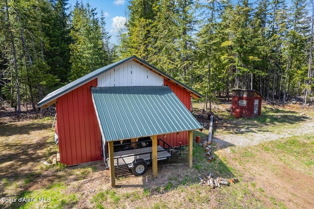760 Fox Glen Rd, Sandpoint, ID 83864 - view of pole building with a view of trees