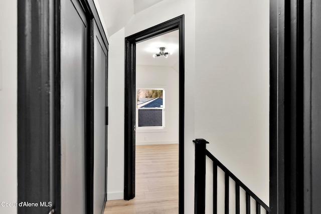 513 Mission Ave, Kellogg, ID 83837 - corridor featuring light wood finished floors, baseboards, and an upstairs landing