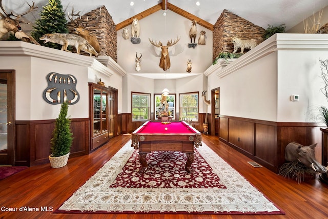 game room with a wainscoted wall, billiards, wood finished floors, and high vaulted ceiling