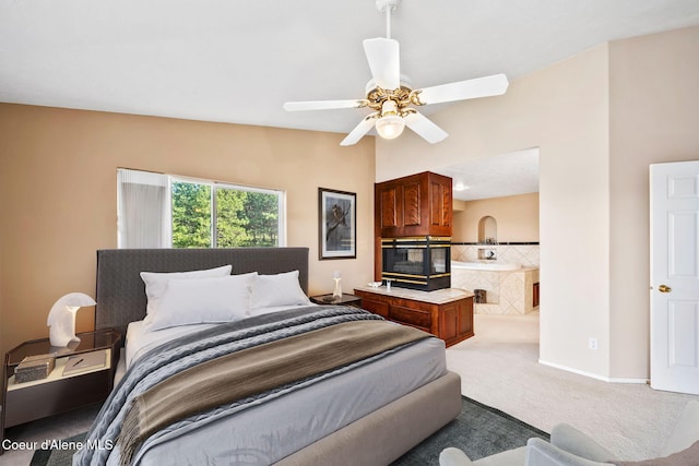 carpeted bedroom with a ceiling fan