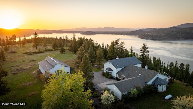 view from above of property featuring a water and mountain view