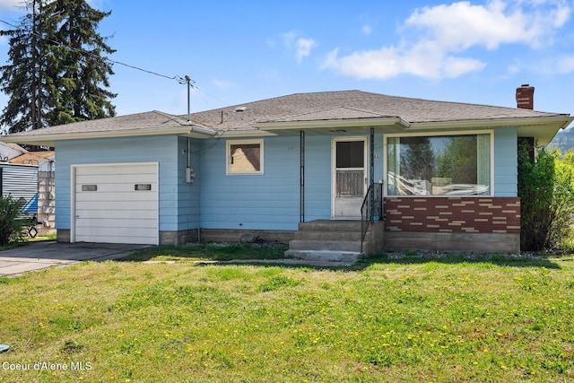 ranch-style house featuring an attached garage, driveway, entry steps, a front lawn, and a chimney
