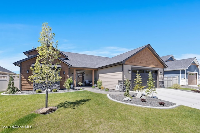 view of front of home with an attached garage, driveway, roof with shingles, and stone siding