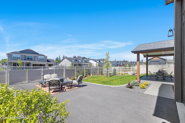 view of patio / terrace featuring a residential view and outdoor dining space