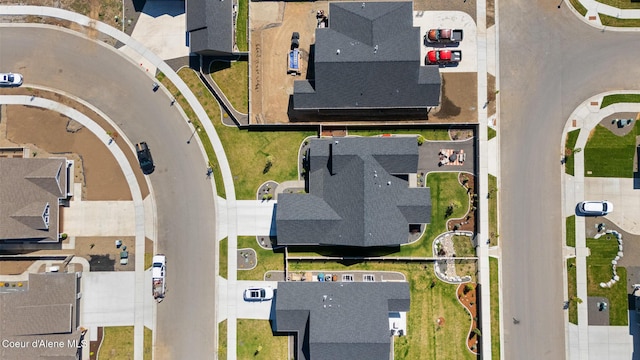 aerial view of property's location with nearby suburban area
