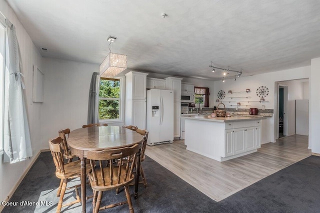 9727 W E St, Worley, ID 83876 - dining space with light wood-style floors