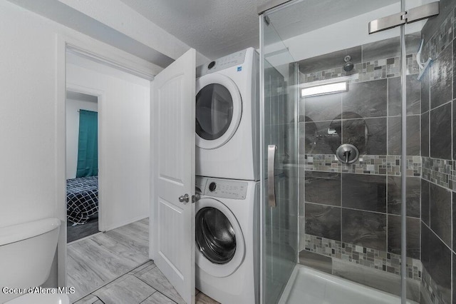 9727 W E St, Worley, ID 83876 - laundry area with estacked washer and dryer