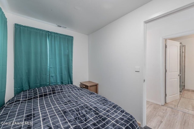 9727 W E St, Worley, ID 83876 - bedroom with wood finished floors and baseboards