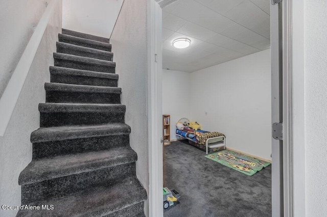 9727 W E St, Worley, ID 83876 - stairway featuring carpet floors
