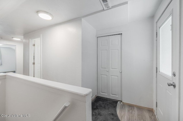9727 W E St, Worley, ID 83876 - hallway with baseboards and wood finished floors