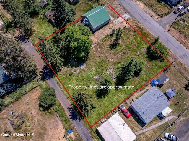 9727 W E St, Worley, ID 83876 - aerial view of property and surrounding area with property parcel outlined